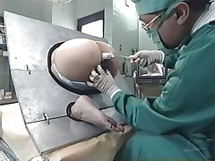 Take a look at what's going on here. A pretty Nippon chick is the subject of an experiment and she can't do nothing except obey and allow the scientist to do his job. He inserts different liquids in her ass, filling her up. Why is she here and what's happening? Let's find out!